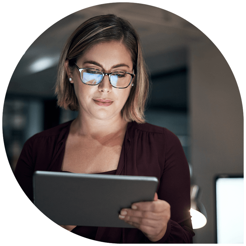Close up of business professional engaged in a productive discussion in a modern office setting, showcasing collaboration and teamwork.