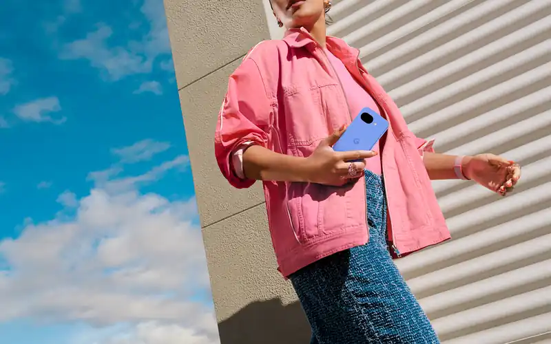 Girl walking with a google pixel phone.
