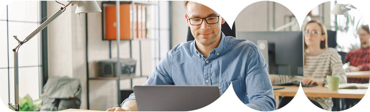 Man on laptop working.