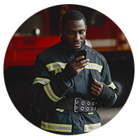 Fireman using mobile device