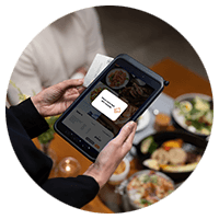 Person holding a tablet