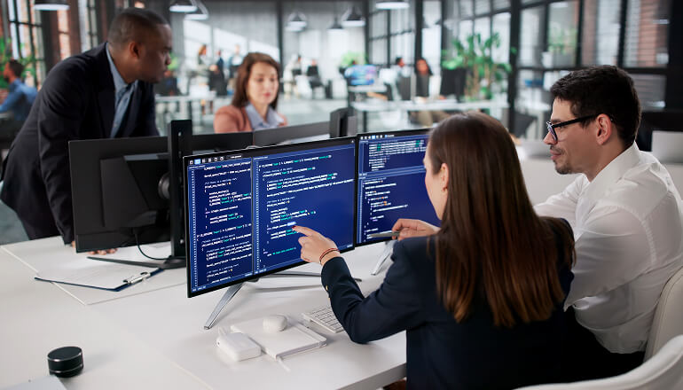 Man on work computer doing his job.