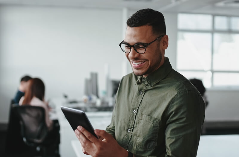 Design professional signing software license agreement on smartphone for a design firm