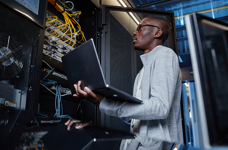 Man working in server room