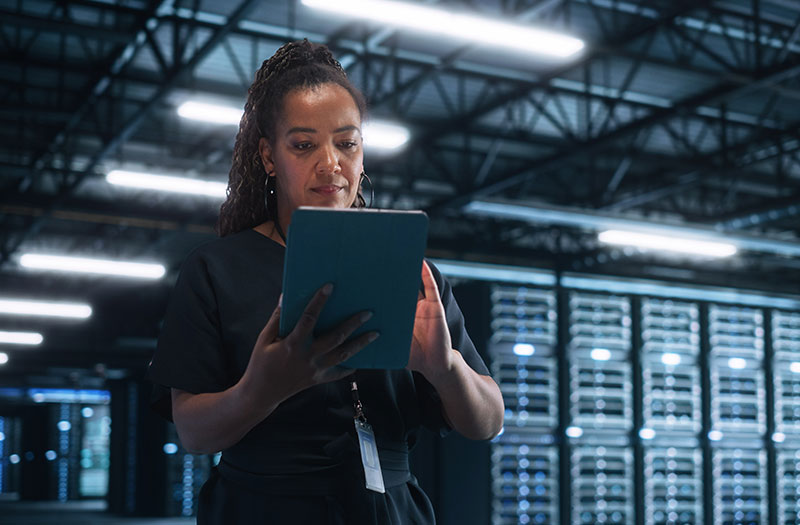 Woman working in data center