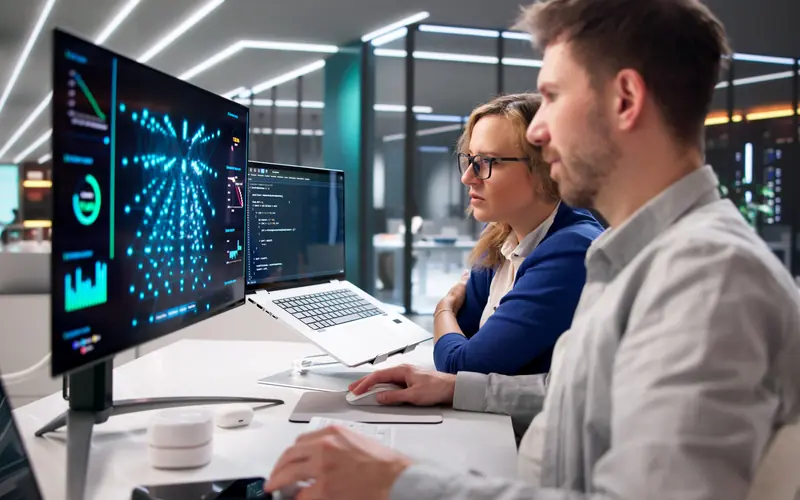 Business professional using automated workflows and self-service tools. 
