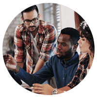 Group of colleagues meet to talk about hybrid cloud plans