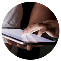 IT professional looking over serveIT professional looking over servers in data centerrs in data center