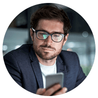 IT professional with laptop working in data center