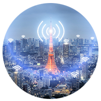 Tower in the city, glowing.