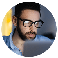 Business manager reviewing software usage among his team before purchase