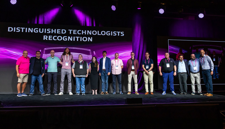 Insight team standing proud at event