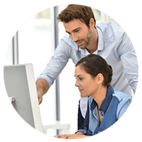 Two dedicated software experts using computer