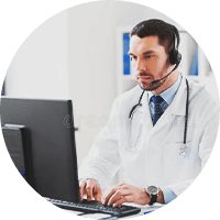 A doctor using desktop computer