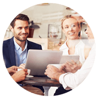 People collaborating on a laptop computer