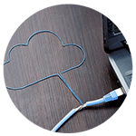 Computer cord in the forming the shape of a cloud.