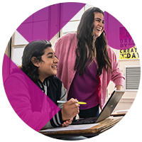 Students using chromebook during lecture
