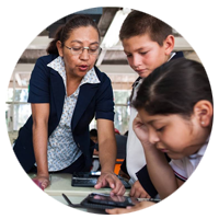 Woman teaching the children