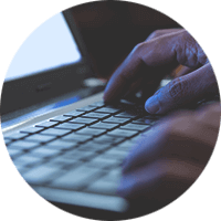 Hand close-up using laptop