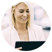 Smiling women working on tablet computer