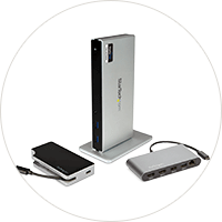 Desks in classroom with large monitors to engage students.