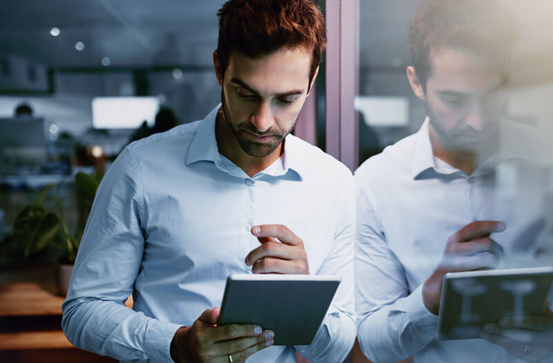 Business professional using tablet