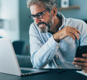 Business leader ordering new technology devices for team