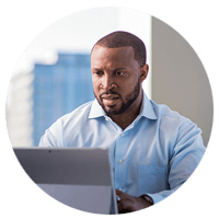 Man working on a tablet in a conference room