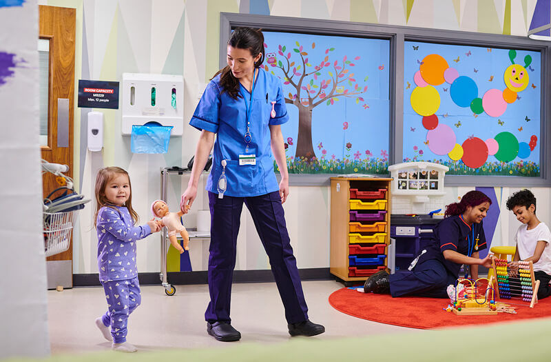 Child walking in to see her wish granted by the Make-A-Wish Foundation