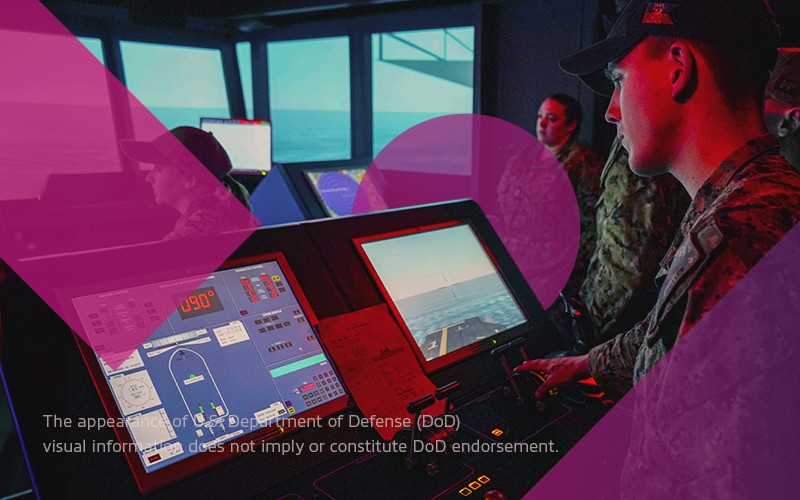 military man on computer