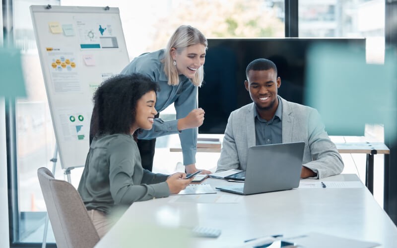 Teammates working together at the office