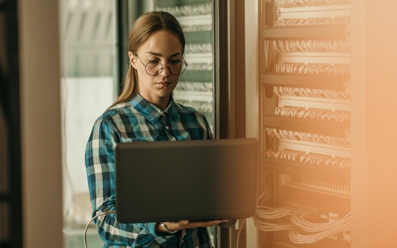 Aria Operations engineer with laptop