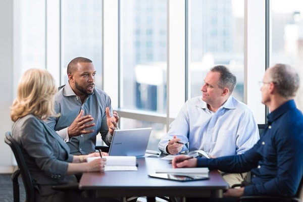 Team discussion around table