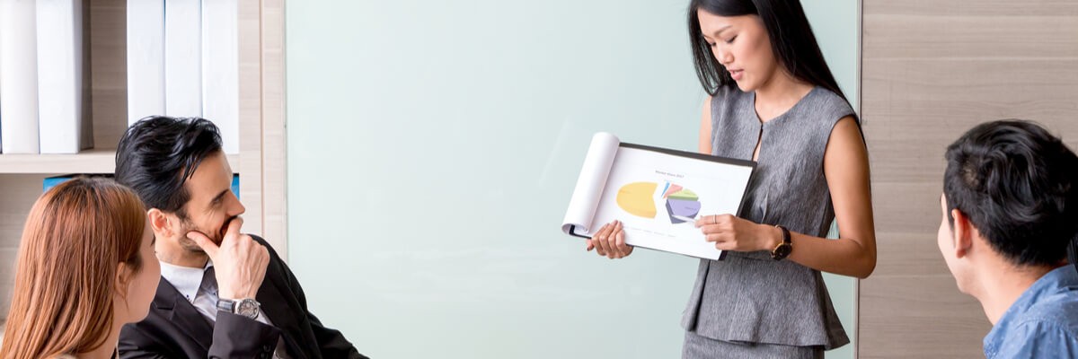 Designing for Brand Identity & Beyond: The Product Is a Symbol Business woman and team having meeting at meeting room in office