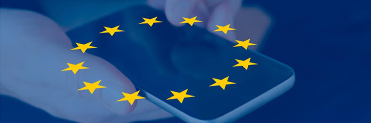Hands using a phone with a blue GDPR overlay