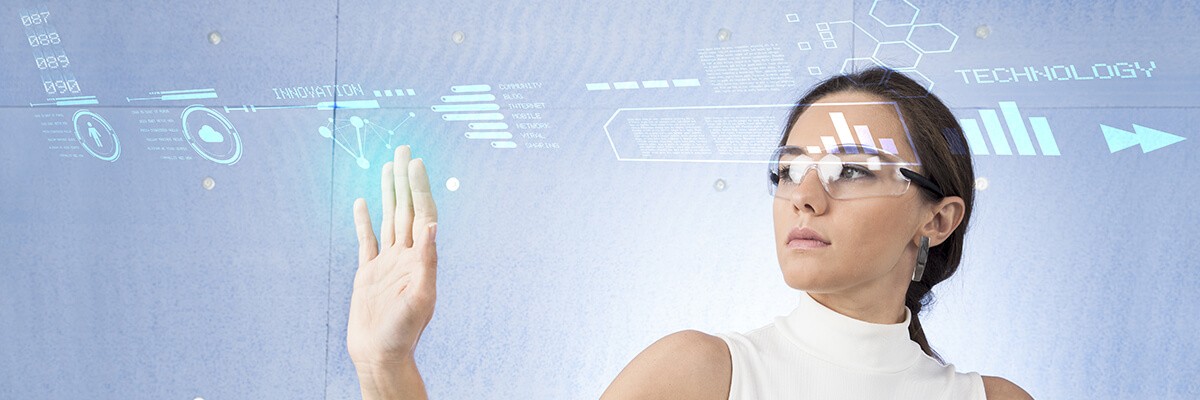 Woman uses augmented reality glasses to view projected images