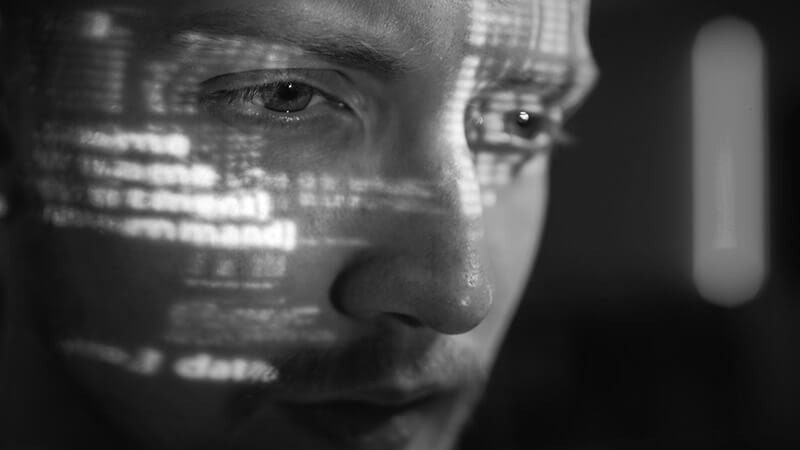 See how IT leaders are adapting their cybersecurity strategy in response to our changing needs Business professional reading data off of computer monitor