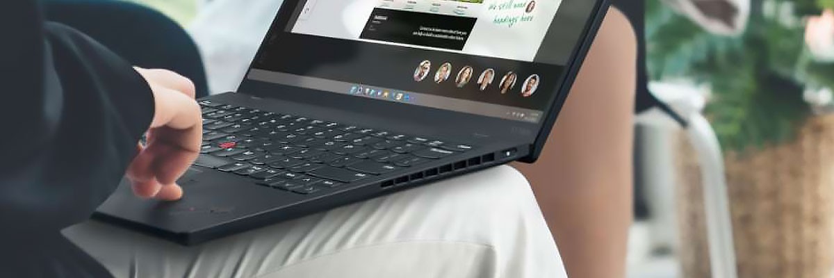 Businessman using Lenovo ThinkShield laptop computer