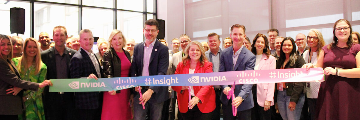Insight team cuts ribbon celebrating the Cisco Secure AI Factory and NVIDIA partnership.