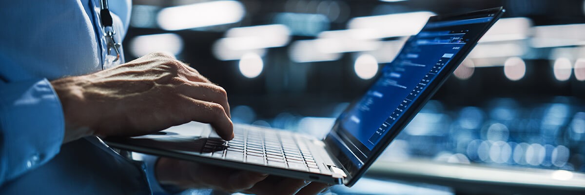 Data Center Programmer Using Digital Laptop Computer, Maintenance IT Specialist