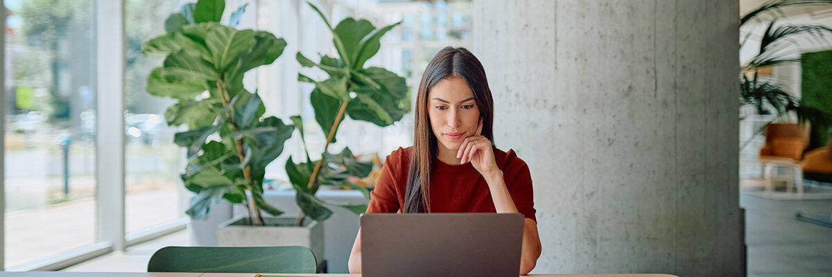 Girl looking at a laptop