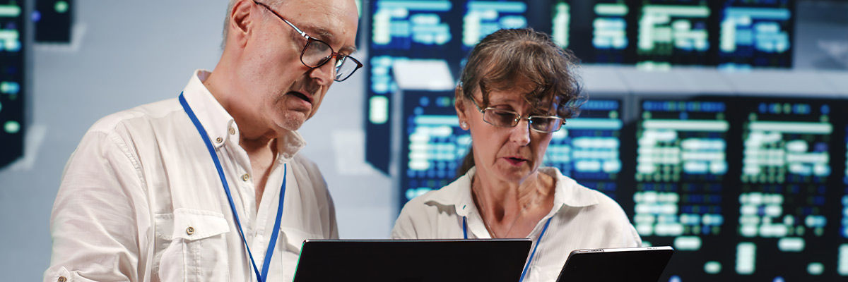 What is cloud security posture management? People on tablets in IT area