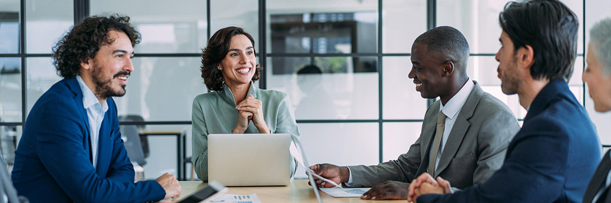 Bussiness people smiling in a meeting