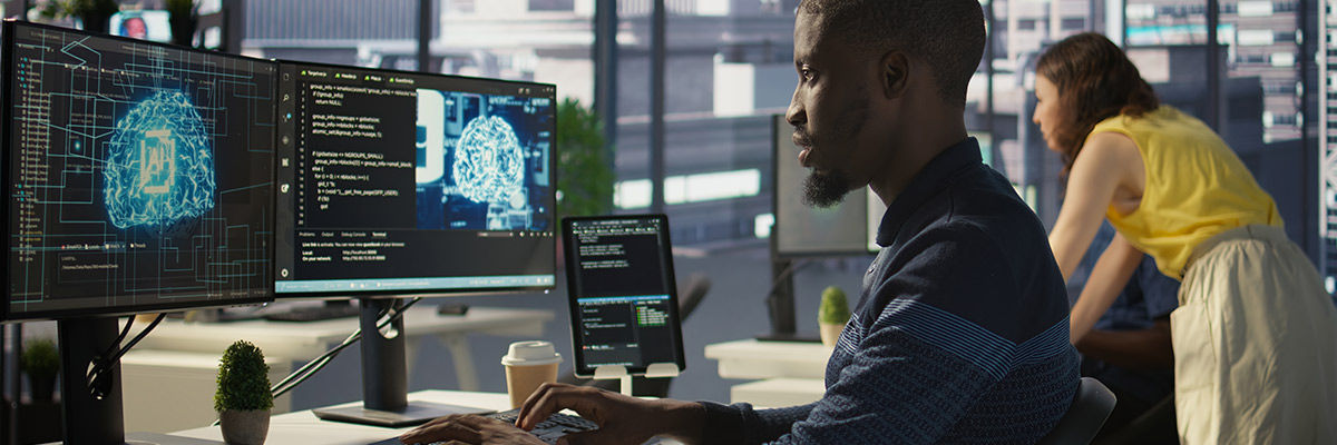 Automation for the Modern Private Cloud User working on monitor with AI
