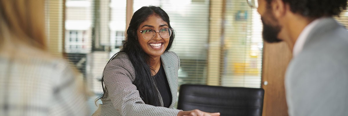 New intern shakes hands with hiring manager