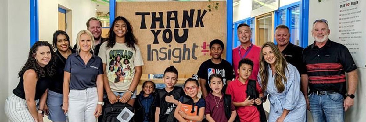 Brocks Jacobs in front of Insight building sign