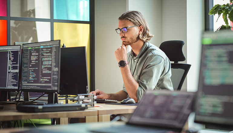Man working on a desktop