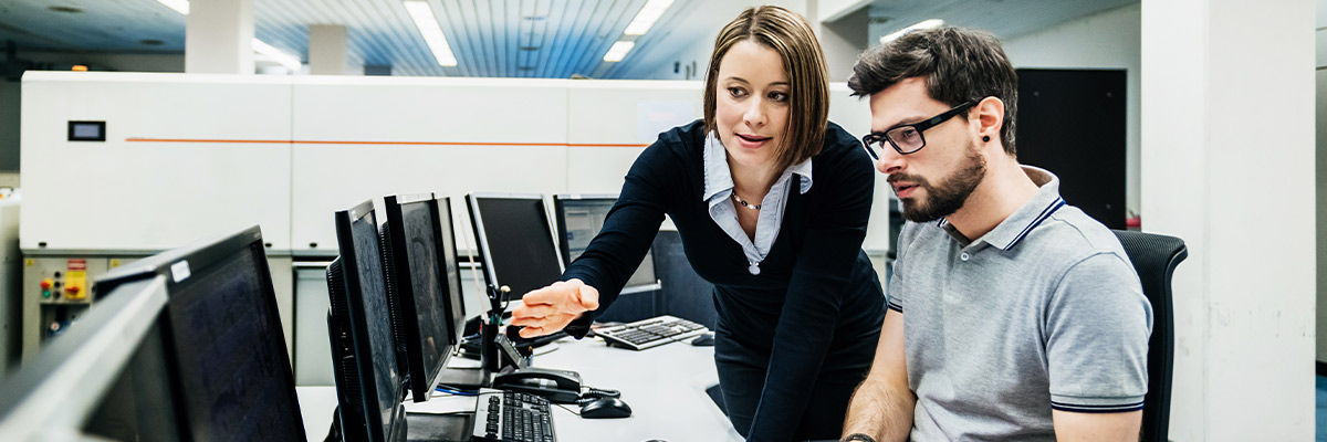 Developers discussing at desk