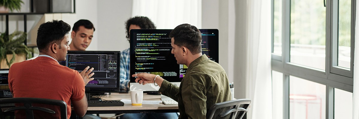 Devs working in open office cover