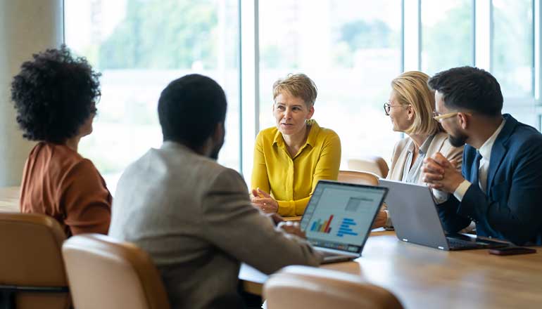 People in a meeting talking